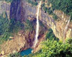 There is a plunge pool shaped down the fall that has remarkable greenish-blue colored water There is a plunge pool shaped down the fall that has remarkable greenish-blue colored water.
